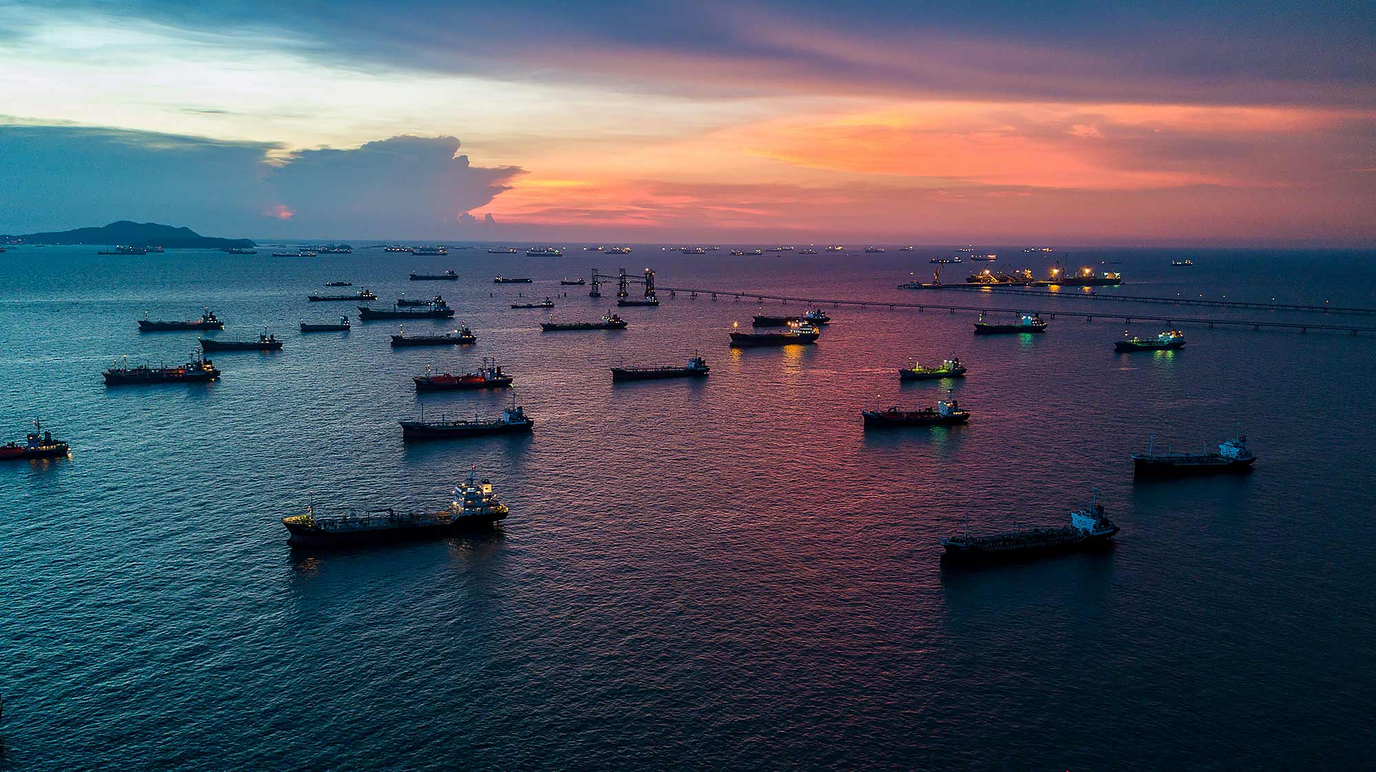 Minton Treharne & Davies Group - Oil Tankers at anchor outside port